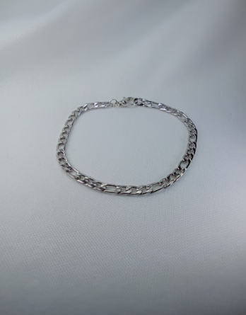 Bracelet mixte en argent avec des maillons torsadés. Bijou créé près de Metz dans l'est de la France.