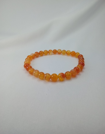 Bracelet mixte onyx orange créé en Moselle.