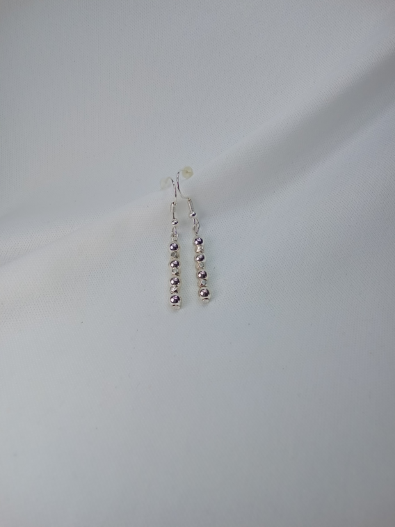 Boucles d'oreilles Magarita en acier inoxydable pour femme. Créées artisanalement près de Metz.